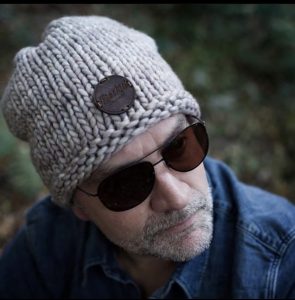 Zachte merino wollen beanie in neutrale kleur, ideaal als warme wintermuts voor dames en heren"