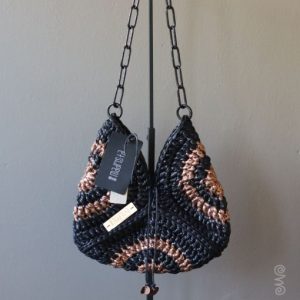 Handmade metallic clutch with a sleek, elegant design for women