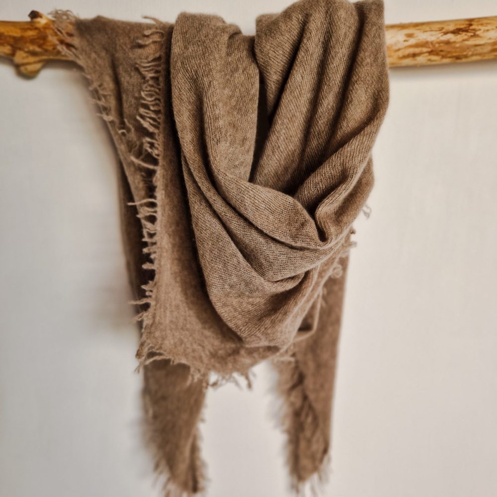 Soft 100% cashmere scarf in triangle shape, perfect for layering